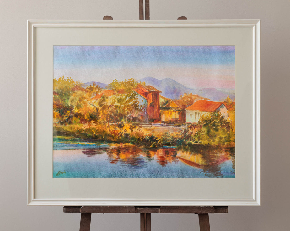 Пейзаж с къщи край езерото